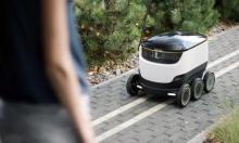 机器人送快递 走得稳更重要