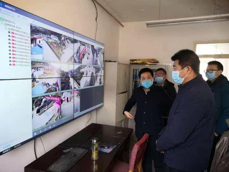 战“疫”系统应用迅速上线机器人、“大喇叭”助力社区防疫