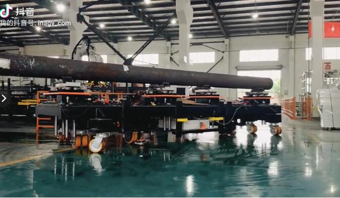 视频|双舵轮全向AGV机器人-12米长物料运输案例