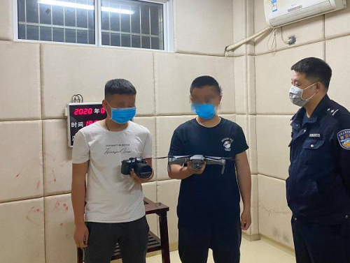 两男子在高铁站旁放无人机拍摄 铁路民警及时制止